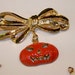 Vintage Goldtone Bow Brooch with 6 Charms for the Holidays