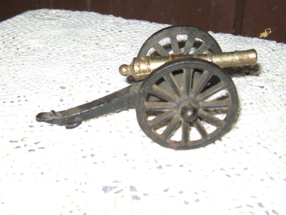 Items similar to Vintage Toy Cannon Cast Iron & Brass Penncraft usa on Etsy