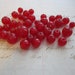 39 glass beads - CHERRY RED - 5mm to 10mm - reclaimed