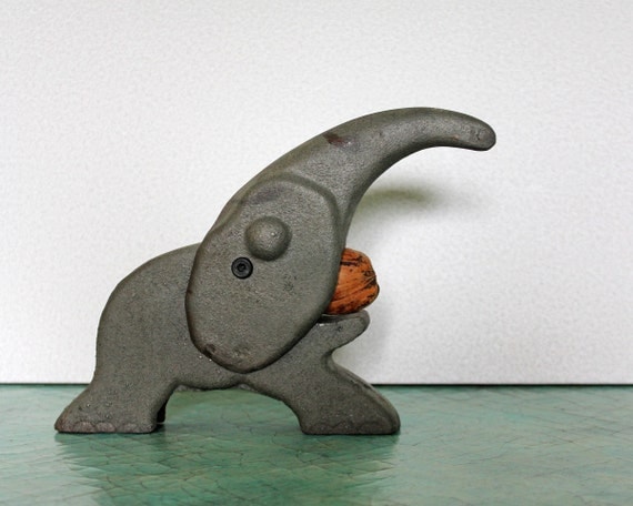 Items similar to Cast iron elephant nut cracker on Etsy