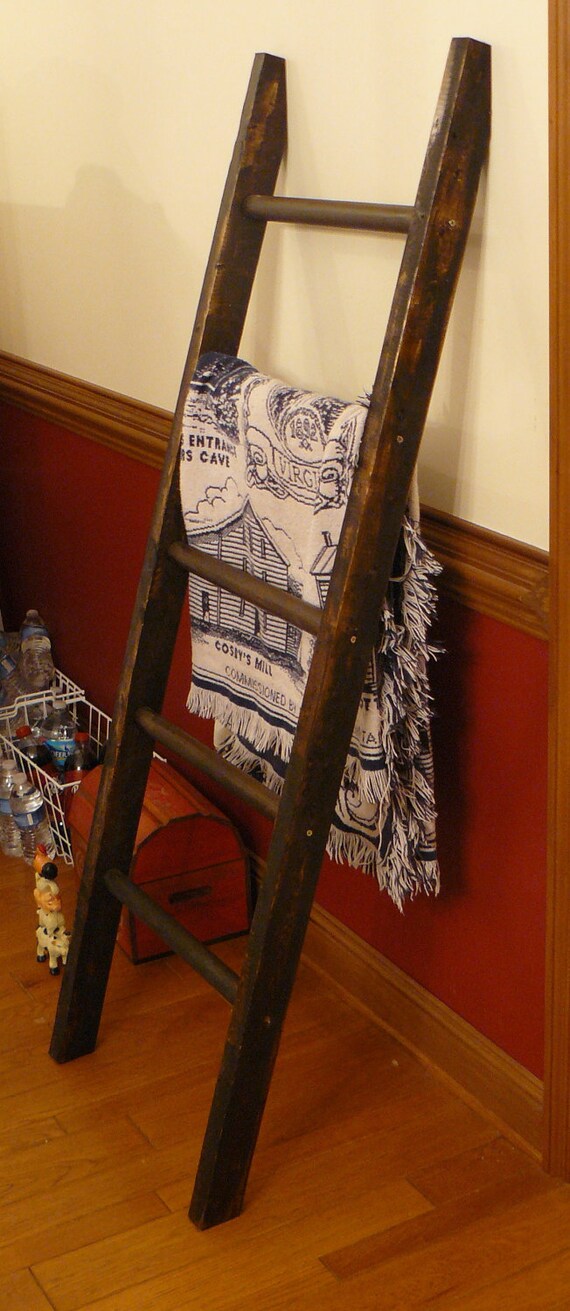 handmade wood quilt or blanket ladder.