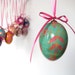 Green Egg with Pink flowers on a string, Ukrainian Pysanka ornament
