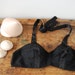 50s black bullet cone bra with two sets of pointed tip fillers