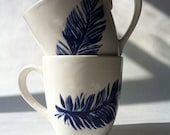 Set of 2 blue indigo, navy blue and white feather ceramic coffee, tea, mugs, cups by Jessica Howard