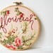 Hand Embroidery Hoop Art. "Flourish" Hand Stitched Text on Vintage Inspired Pink Floral Fabric. Handmade by merriweathercouncil on Etsy