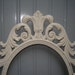 Ornate Oval Frame - painted Creamy White and lightly distressed