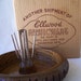 Vintage Ellwood Rusticware wood slice nut bowl set with cracker and 5 nut picks in original box.