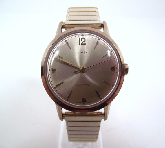 Items similar to Vintage 1965 Gold Color Timex Self Wind Retro Style ...