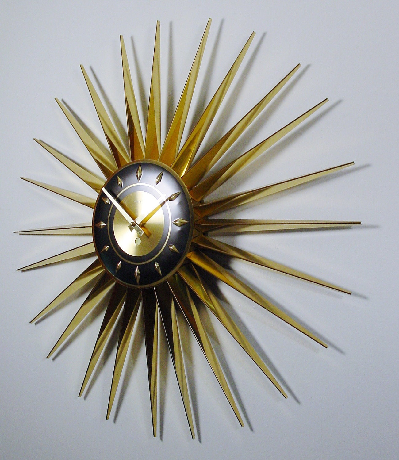 Mid Century Modern Starburst Clock by Welby. 24 Rays Atomic