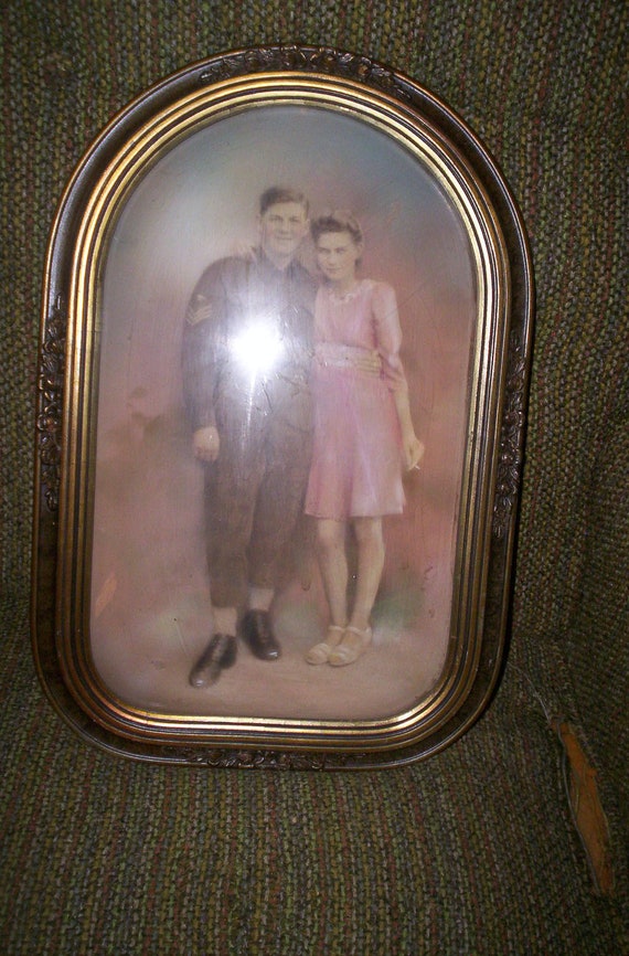 vintage bubble glass picture frame with war picture