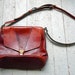 1970s Eqbal Oxblood and Gold Leather Bucket Handbag