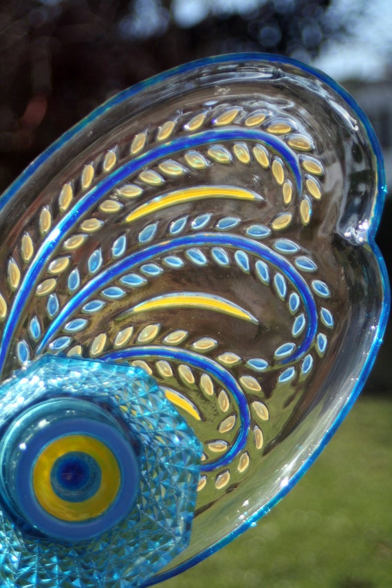 Glass Plate Garden art and Yard art with recycled glass on