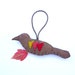 Raven geometric ornament with red, orange and yellow, number 52