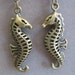Earrings Seahorse Charm and Glass Bead In Antiqued Bronze
