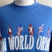 Reserved DF 80's Pro-Spirits "New World Order Peace on Earth" red white blue puffy print, usa france norway uk flags united nations
