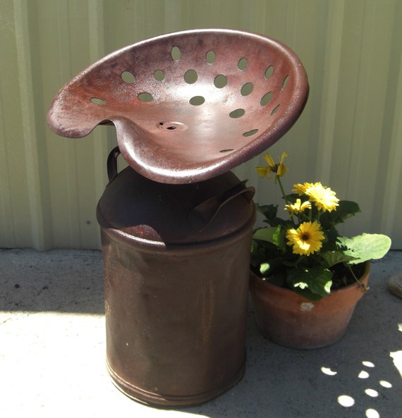 Tractor Seat Milk Can Stool. All steel construction with