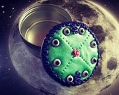 Neon mint and purple evil eye jewelry tin Neon mint and purple evil eye jewelry tin