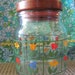 1980s, Nina, wood lidded, glass canister with spring flowers