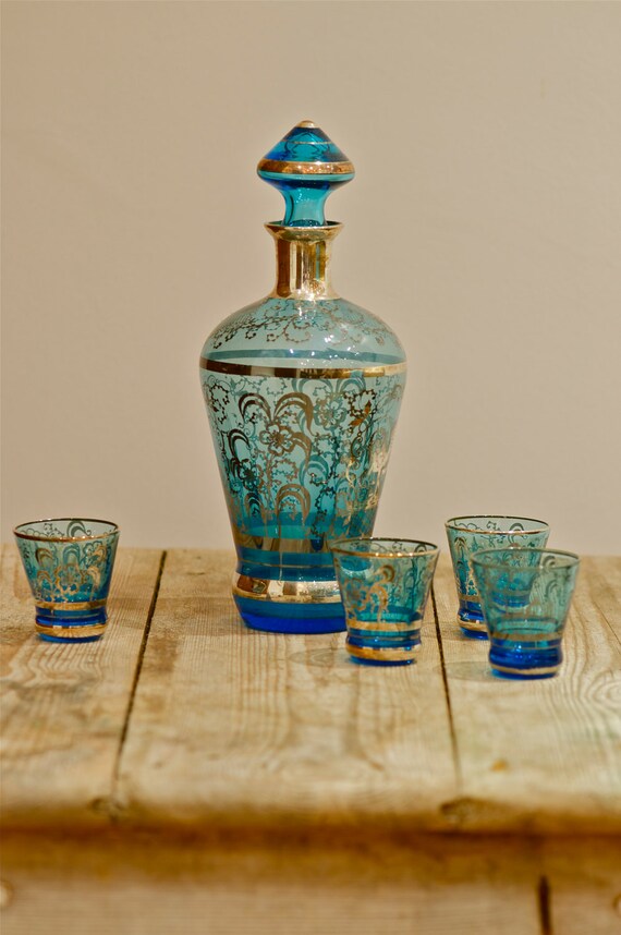 Vintage Blue glass decanter and four glasses with