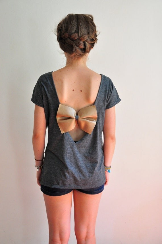 marl 200 ne back less grey shirt with a gold big bow marl 200 ne back less grey shirt with a gold big bow