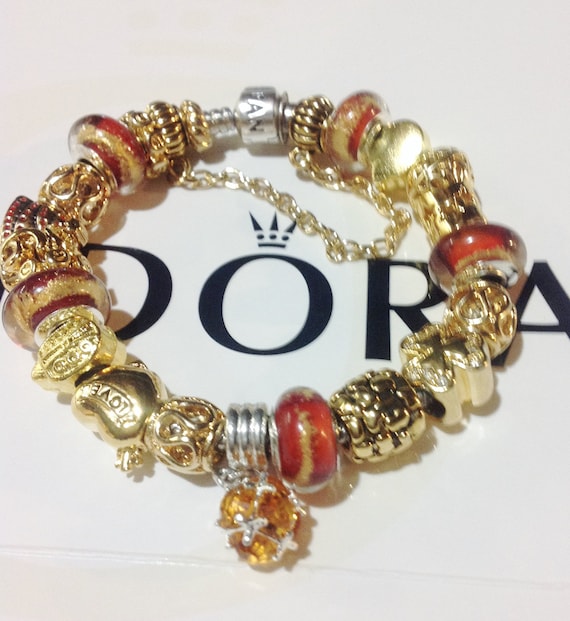 Items similar to Pandora charm bracelet, Authentic. Beautiful gold