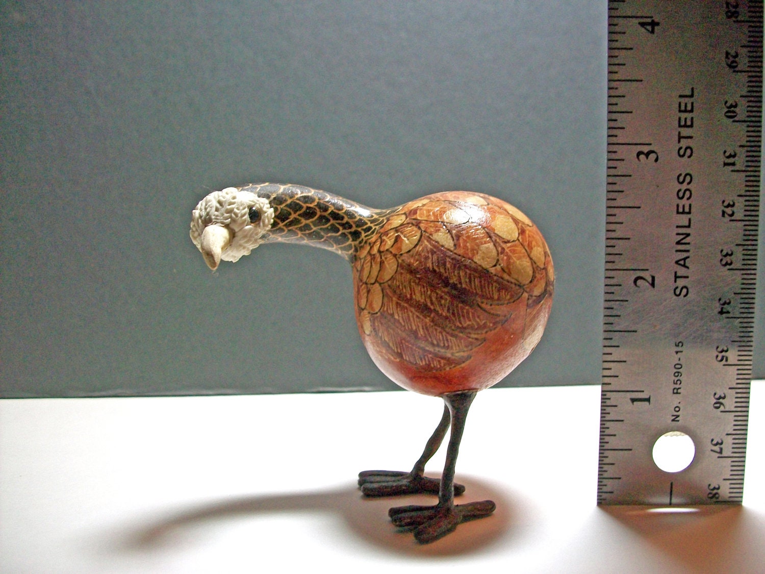 Bird made from a dried mini gourd