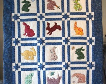 Bunnies playing Baby Quilt 12 rabbits