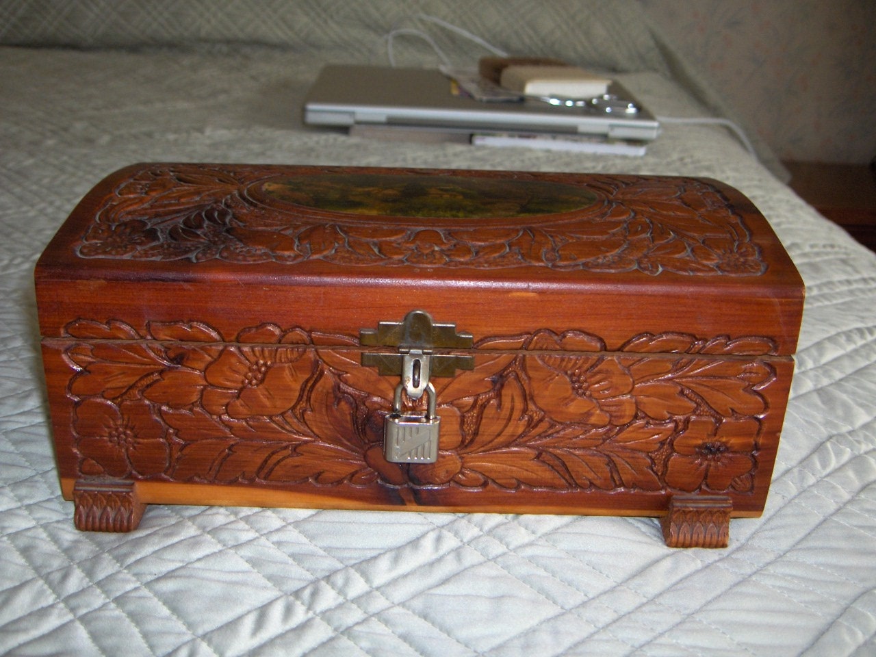 Small Antique Cedar chest with designs cut into the top and