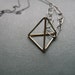 Golden Tetrahedron Necklace - geometric brass pyramid oxidized silver handmade chain