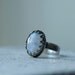 Reserved. Moonstone ring sterling silver. Blue flash rainbow moonstone. Textured band. Size 5.5