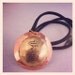 Etched brass and copper serenity symbol inspired by "Firefly"