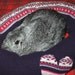 Ugli Donut rabbit bed for a medium sized bunny purple heart Nordic pattern wool