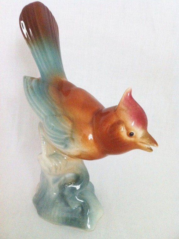 brown bird figurine