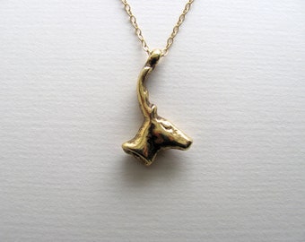 Deer pendant necklace on delicate 14k gold plate chain