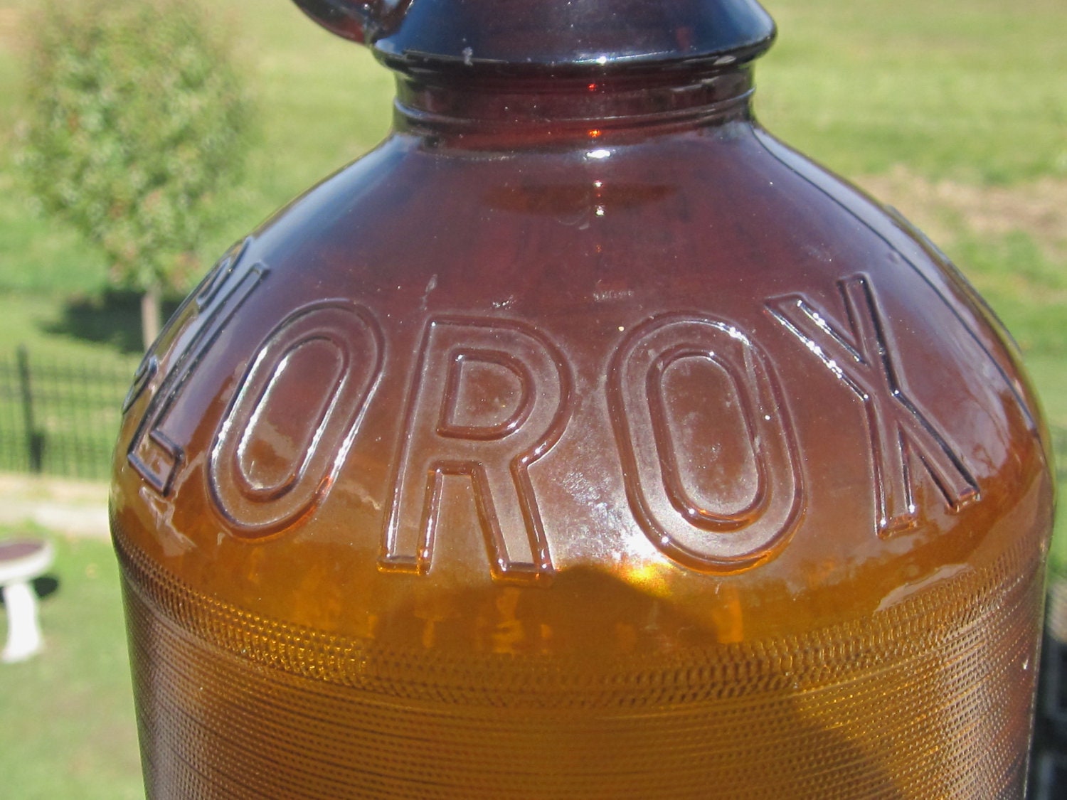 Antique Clorox Bottle with Bakelite Embossed Lid and Loop