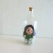 Vintage Wooden Miniature Figurine in a Glass Bottle