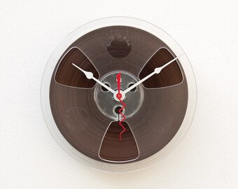 Recycled magnetic tape reel clock