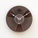 Recycled magnetic tape reel clock