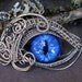 Gothic Steampunk Evil Cat Eye Pendant with Blue glass eye