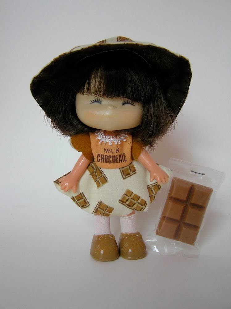 doll with chocolate wrapper