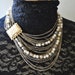 Glamour vintage 50s ,17 strand , drape, flapper style , bib necklace with a large bar clasp.