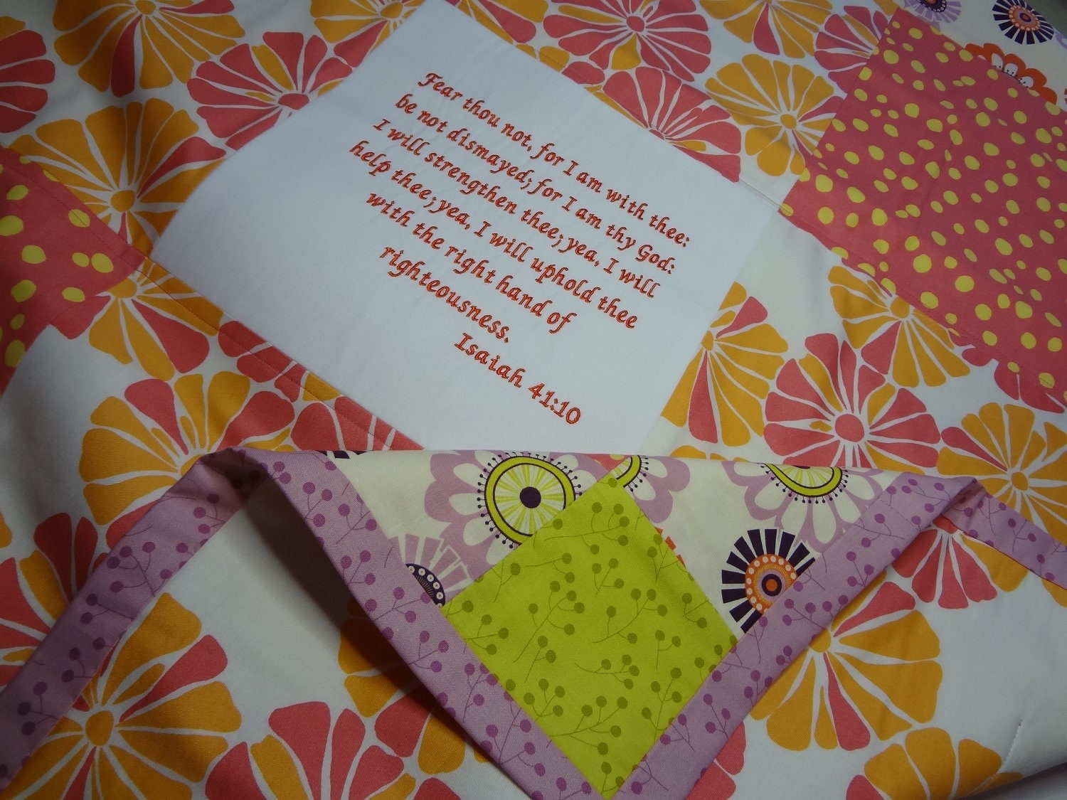 Lap Quilt with Bible Verses Embroidered on top.