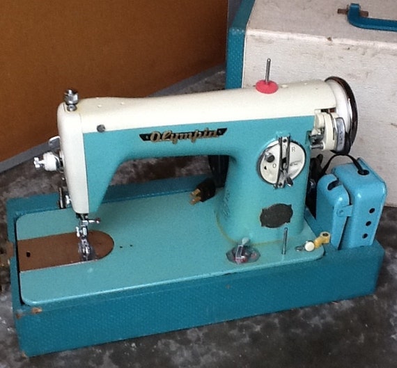 Items similar to Mid-Century Metal Olympia Sewing Machine 1950's on Etsy