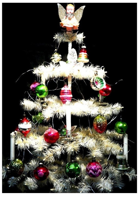 Beautiful feather christmas tree with vintage decorations