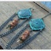 Naga Temple. Snake Vertebrae Bones, Emerald Crystal and Verdigris Tribal Concha medallion earrings