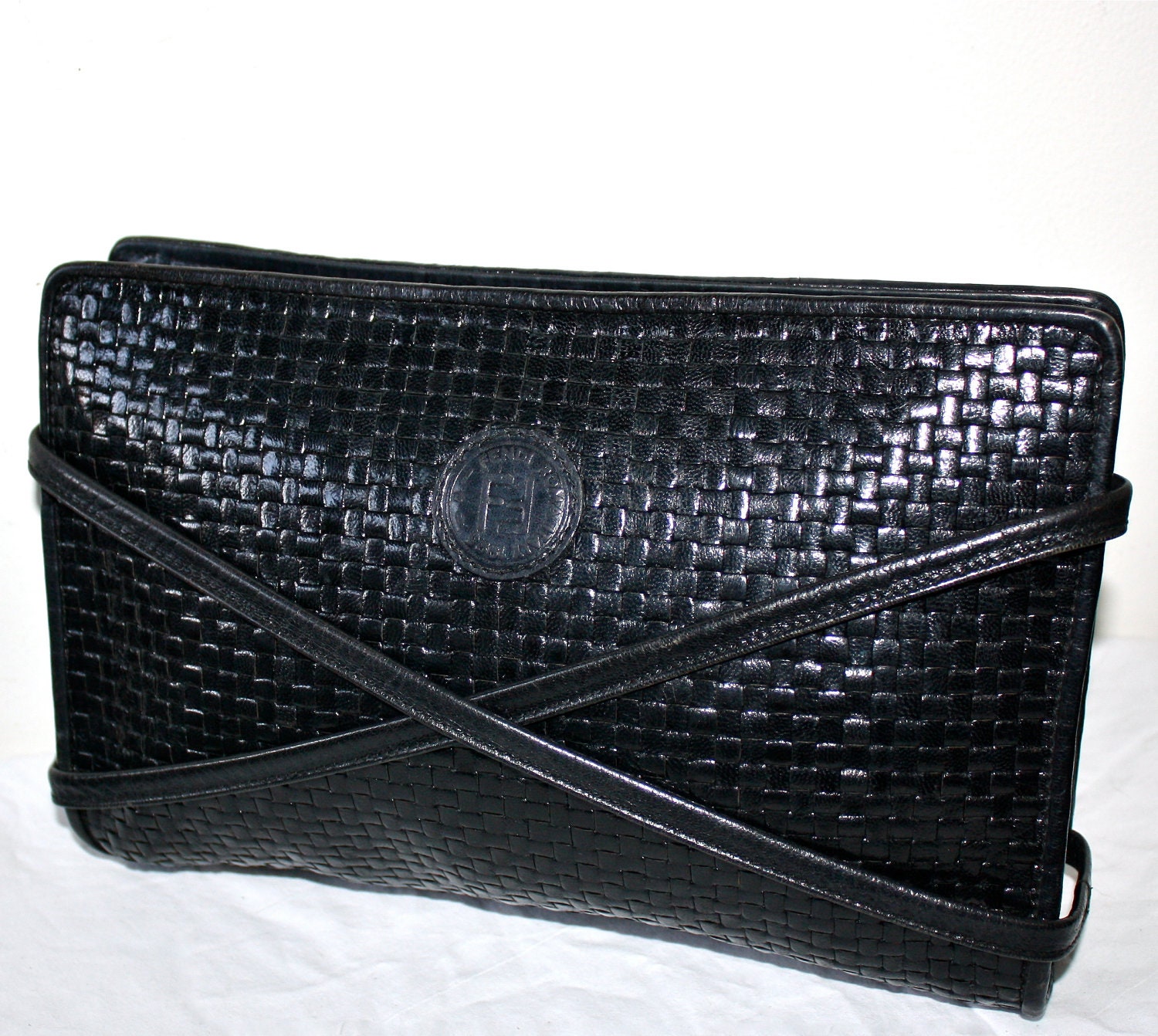 leather woven clutch