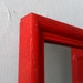 Small Framed Accent Mirror in Bright Blood Orange 7 by 5 inches
