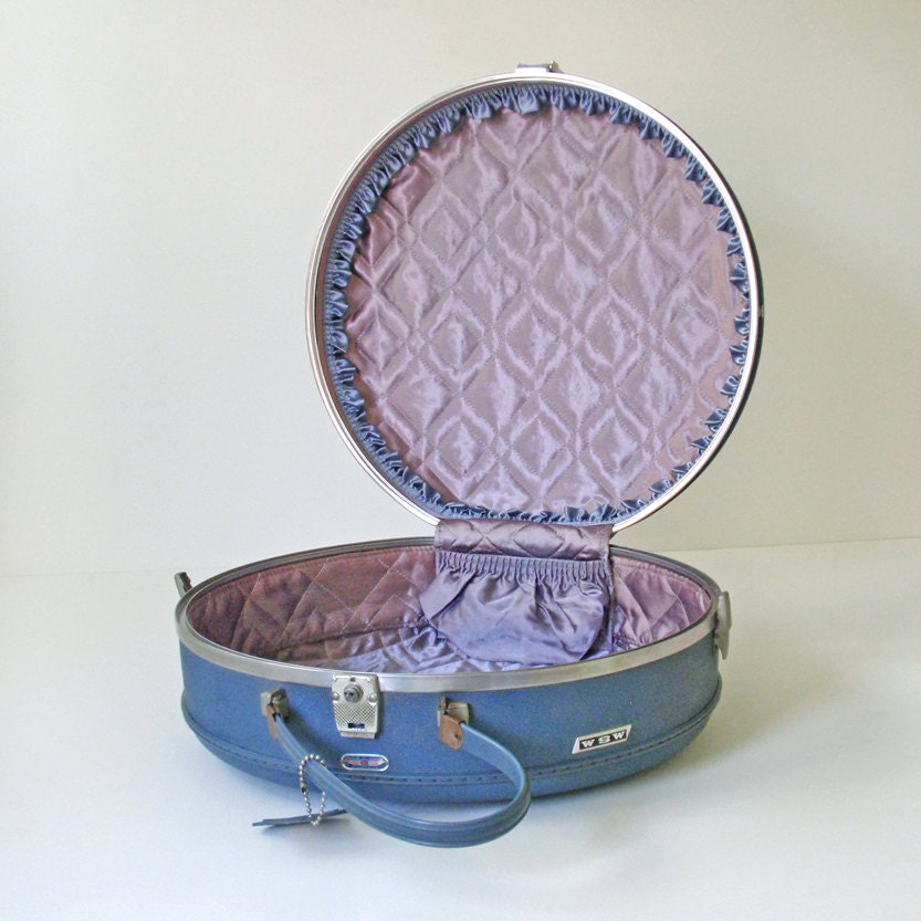 vintage american tourister round luggage