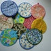 Lot of 11 Vintage Pot Holders, Assorted Fabrics and Patterns, Round in Shape, Ready to Hang