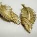 leaf shape with rhinestone earrings - Sarah Coventry clip on